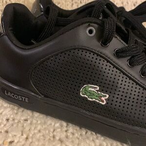 Women’s Lacoste black Carnaby sneakers, size 5.